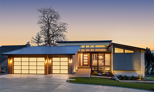 A house with outside lights turned on