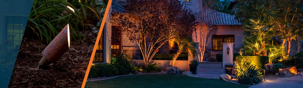 A house lit up at dusk with LR up lights